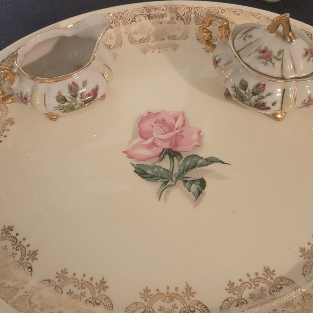 3 chinen set suger and creamer  and matching plate